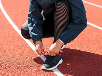 Close up of sports shoes on a running track
