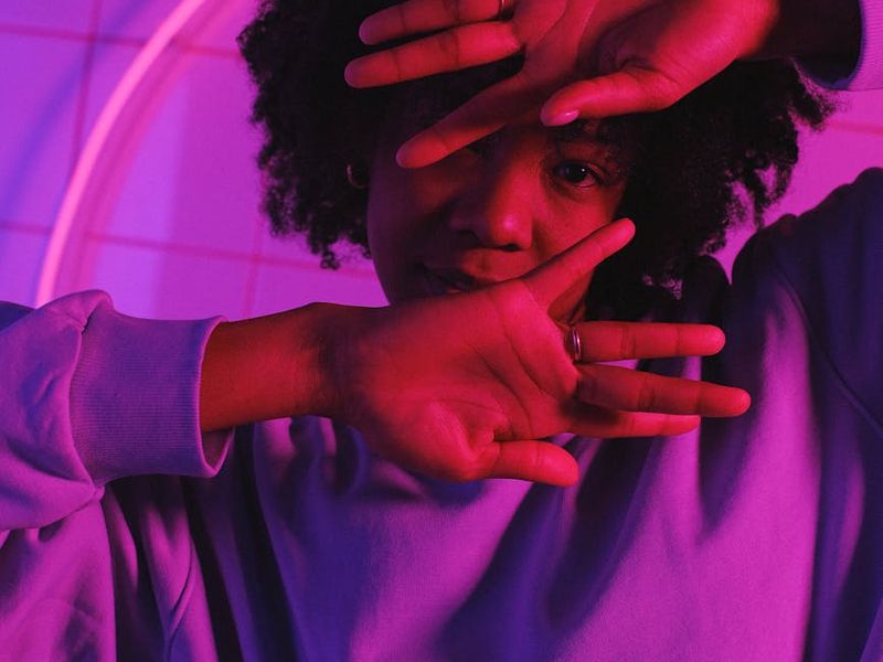 Dynamic blur of a person moving in a bright studio